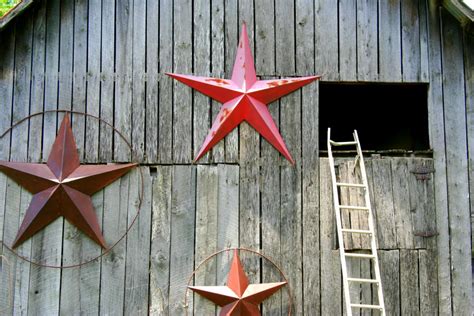 metal star on house meaning swinger|Viral theory behind why people hang up barnstars on their homes .